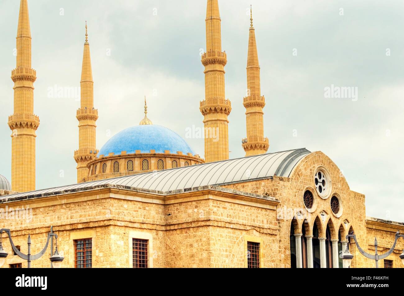 The Mohammad Al-Amin Mosque situated in Downtown Beirut, in Lebanon as viewed rising over the Greek Orthodox church of St George Stock Photo