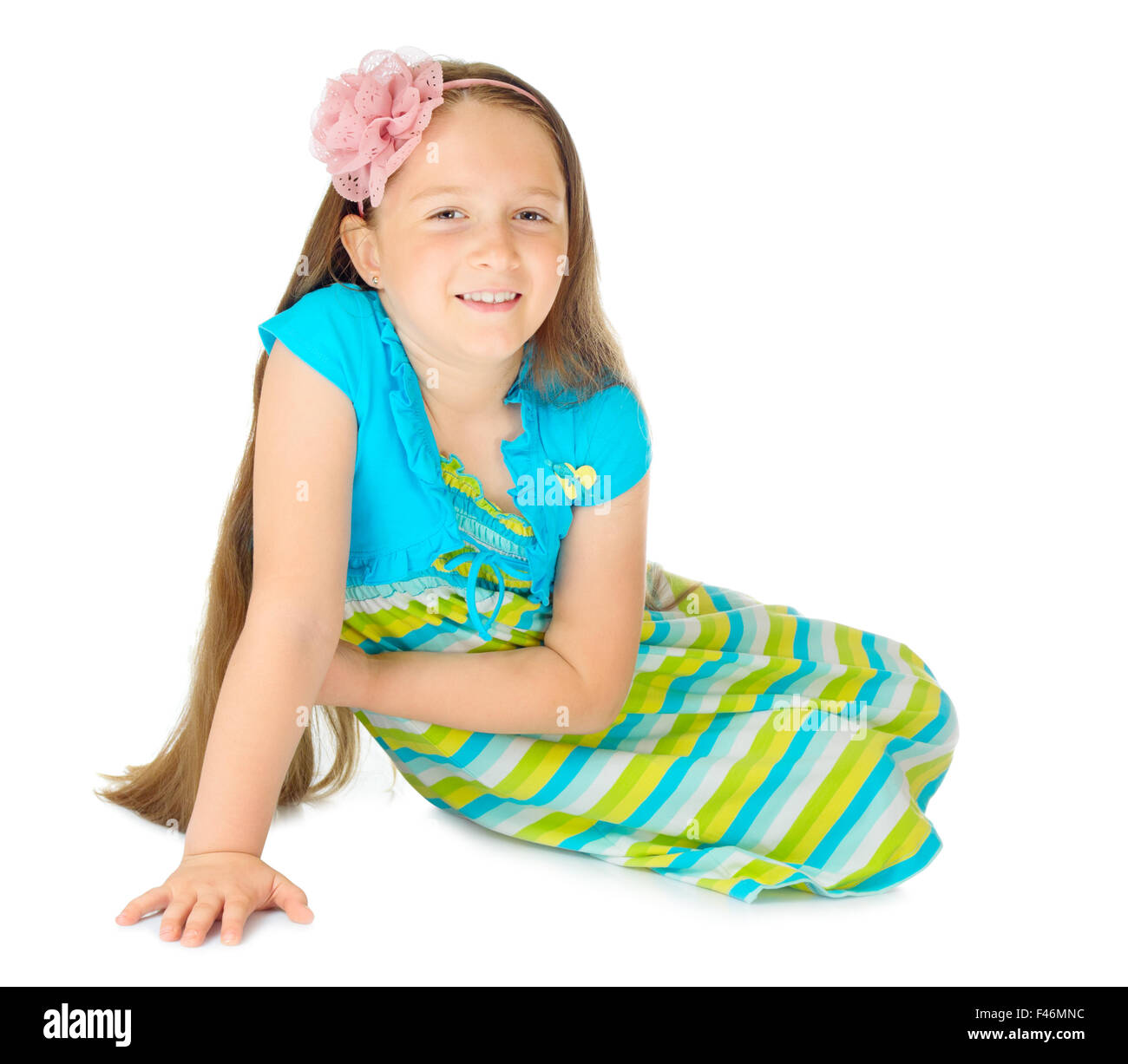 Little girl in blue dress isolated Stock Photo Alamy