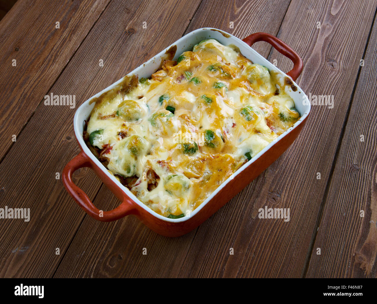 Homemade Chicken Divan - chicken casserole served with almonds, and Mornay sauce.  American cuisine Stock Photo