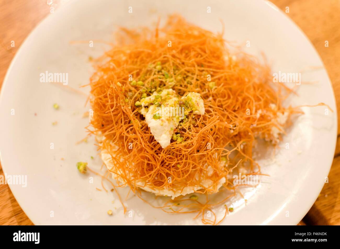 A delicious lebanese dessert made with vermicelli and ashta cream as well as syrop. Typical dessert served after food in Lebanon Stock Photo