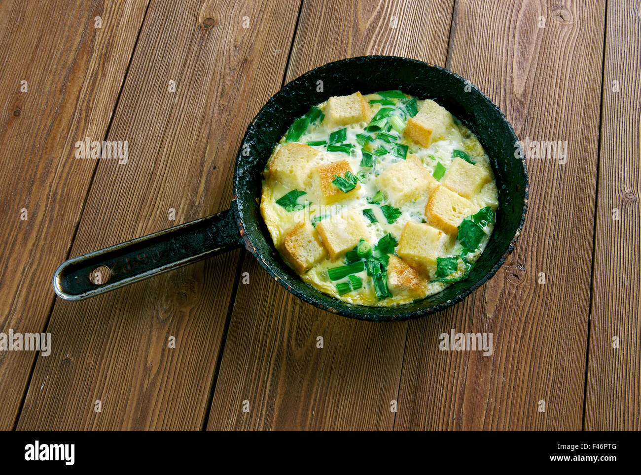Strata  -  casserole dishes in American cuisine. made from a mixture which mainly consists of bread, eggs and cheese Stock Photo