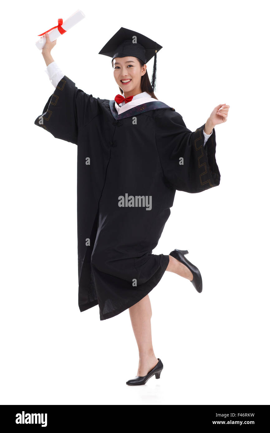 Smiling graduate holding diploma Stock Photo