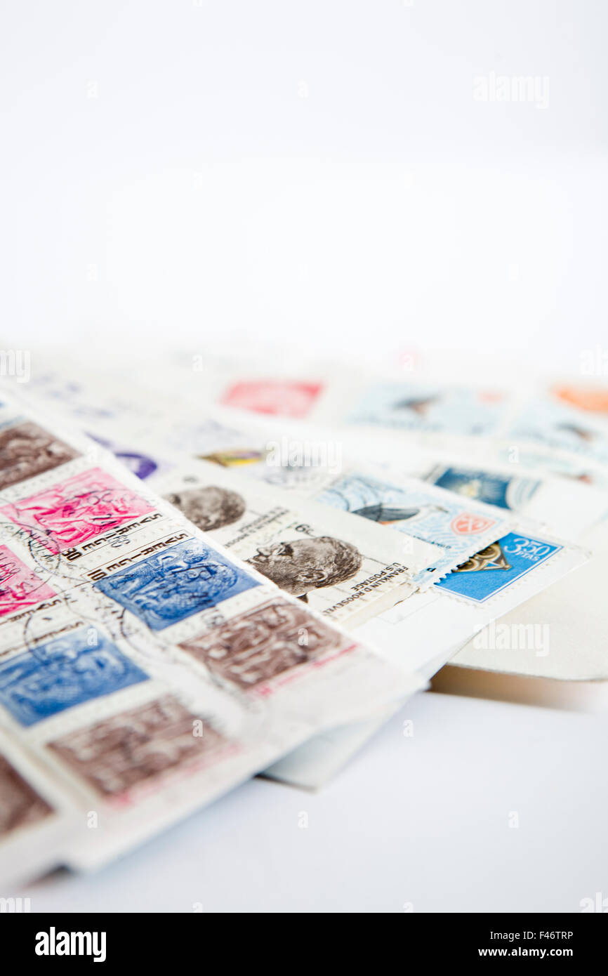 Stamps on old letters, close-up. Stock Photo