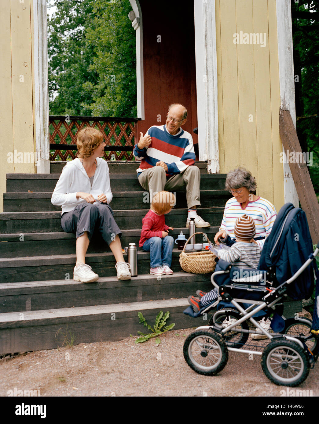 Three generations on a porch, Sweden Stock Photo - Alamy