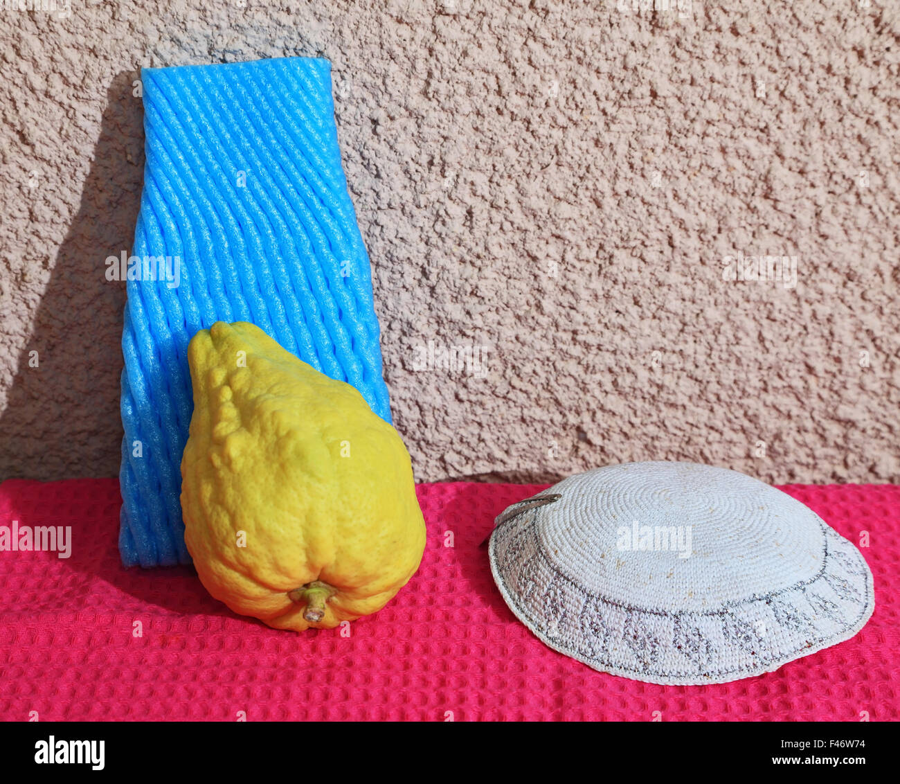 White skullcap and ritual etrog Stock Photo Alamy