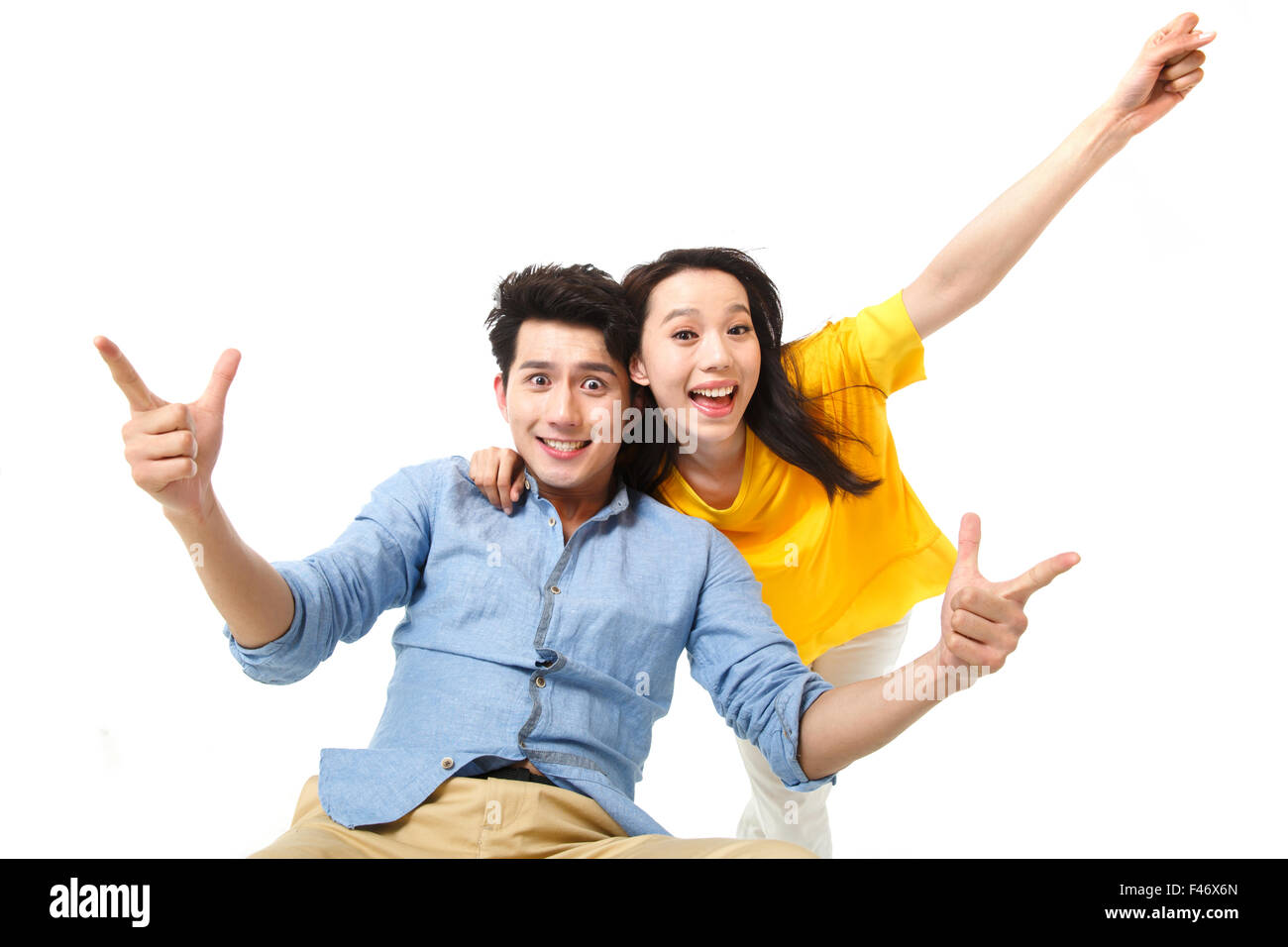 Young woman with arms around man hi-res stock photography and images ...