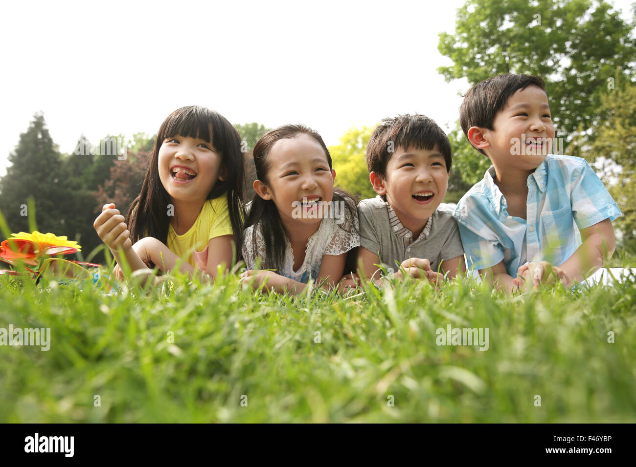 Children lying on front hi-res stock photography and images - Alamy