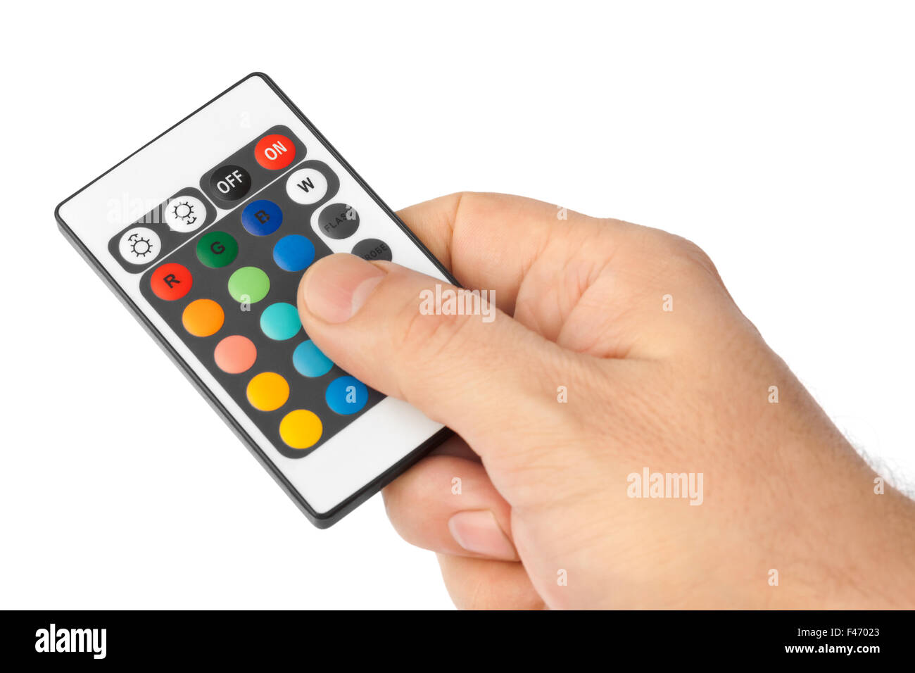 Remote control for change colors in hand Stock Photo - Alamy