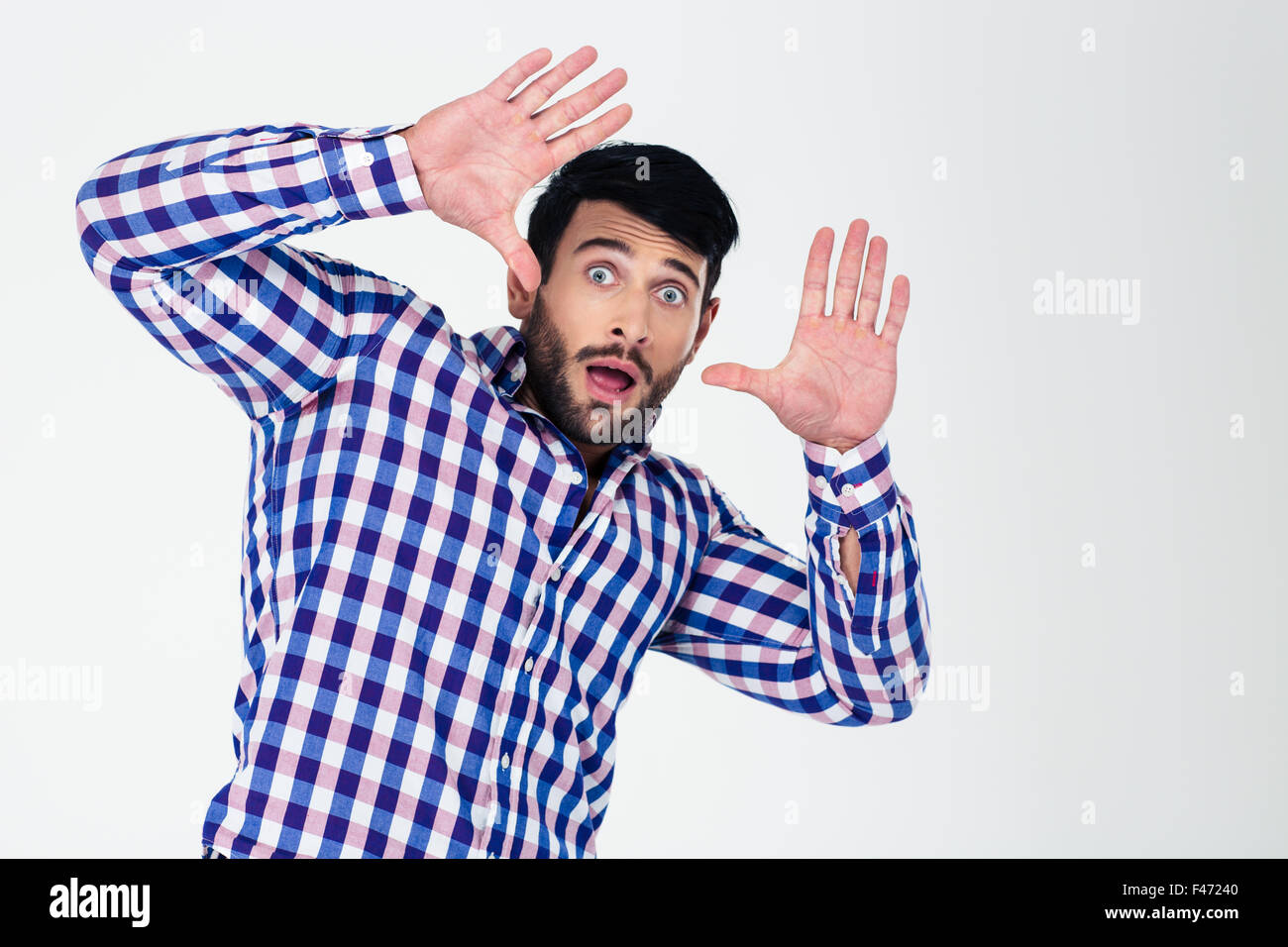 Man scared hands face hi-res stock photography and images - Alamy