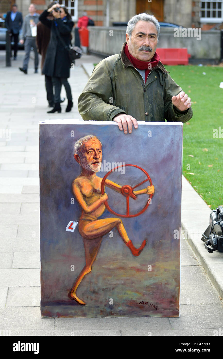 Satirical artist Kaya Mar outside the Houses of Parliament as the new Labour leader Jeremy Corbyn takes part in his second Prime Stock Photo
