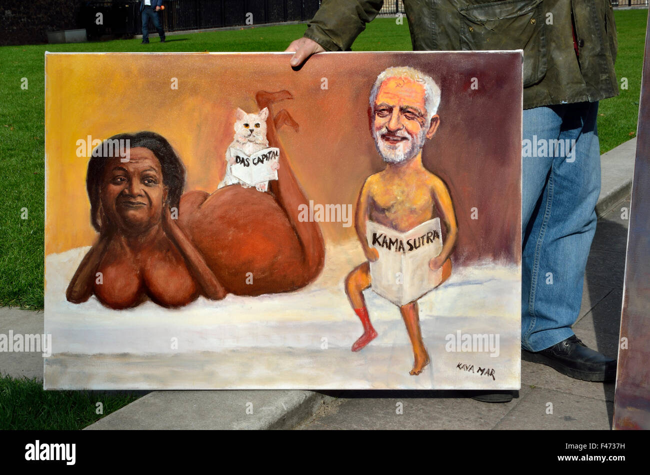 Satirical artist Kaya Mar outside the Houses of Parliament with caricatures of Jeremy Corbyn and Diane Abbott Stock Photo