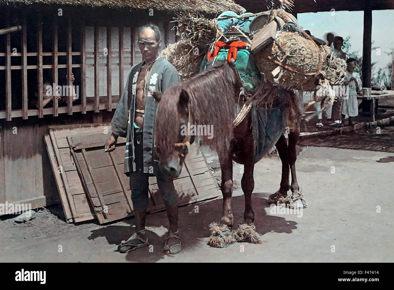 Japanese man with transport horse, Japan Stock Photo