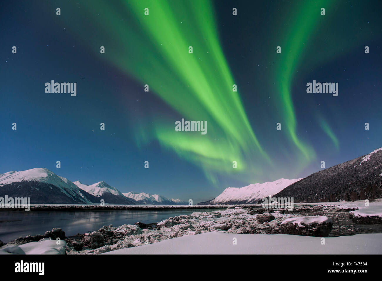 Aurora borealis and moonlight at Turnagain Arm, Alaska, USA Stock Photo