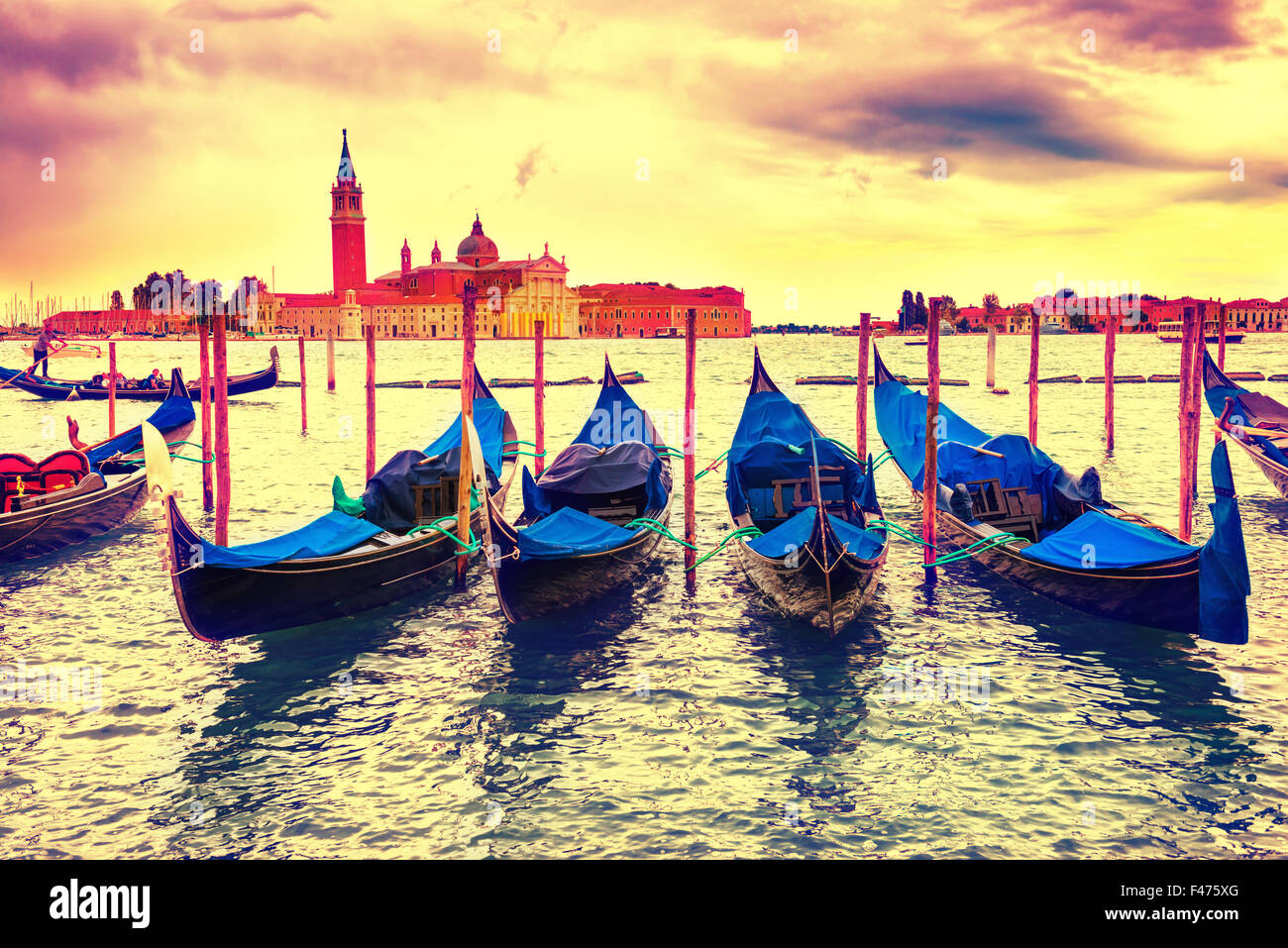 Gondolas at sunset Stock Photo - Alamy