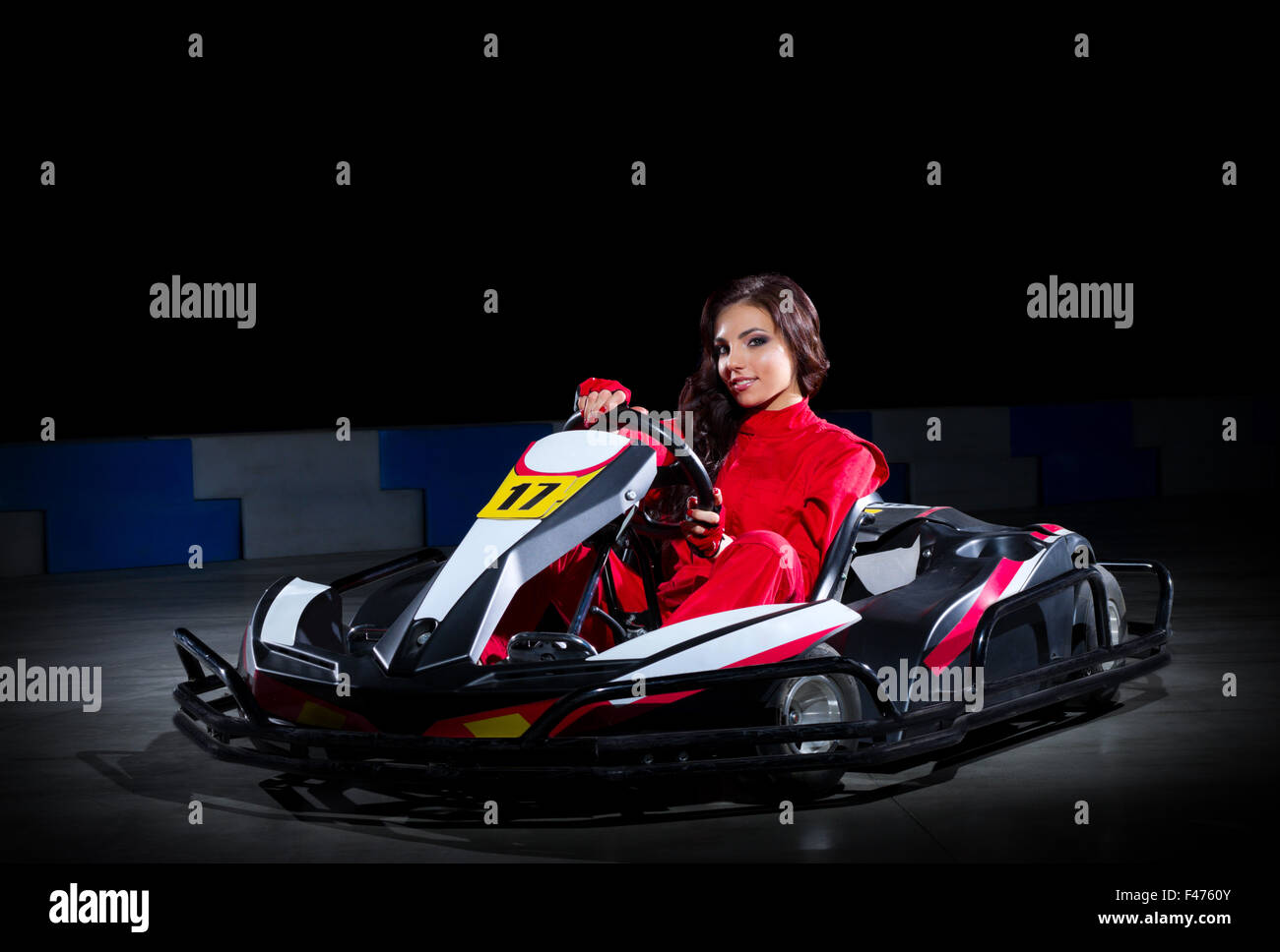 Young girl karting racer isolated Stock Photo - Alamy