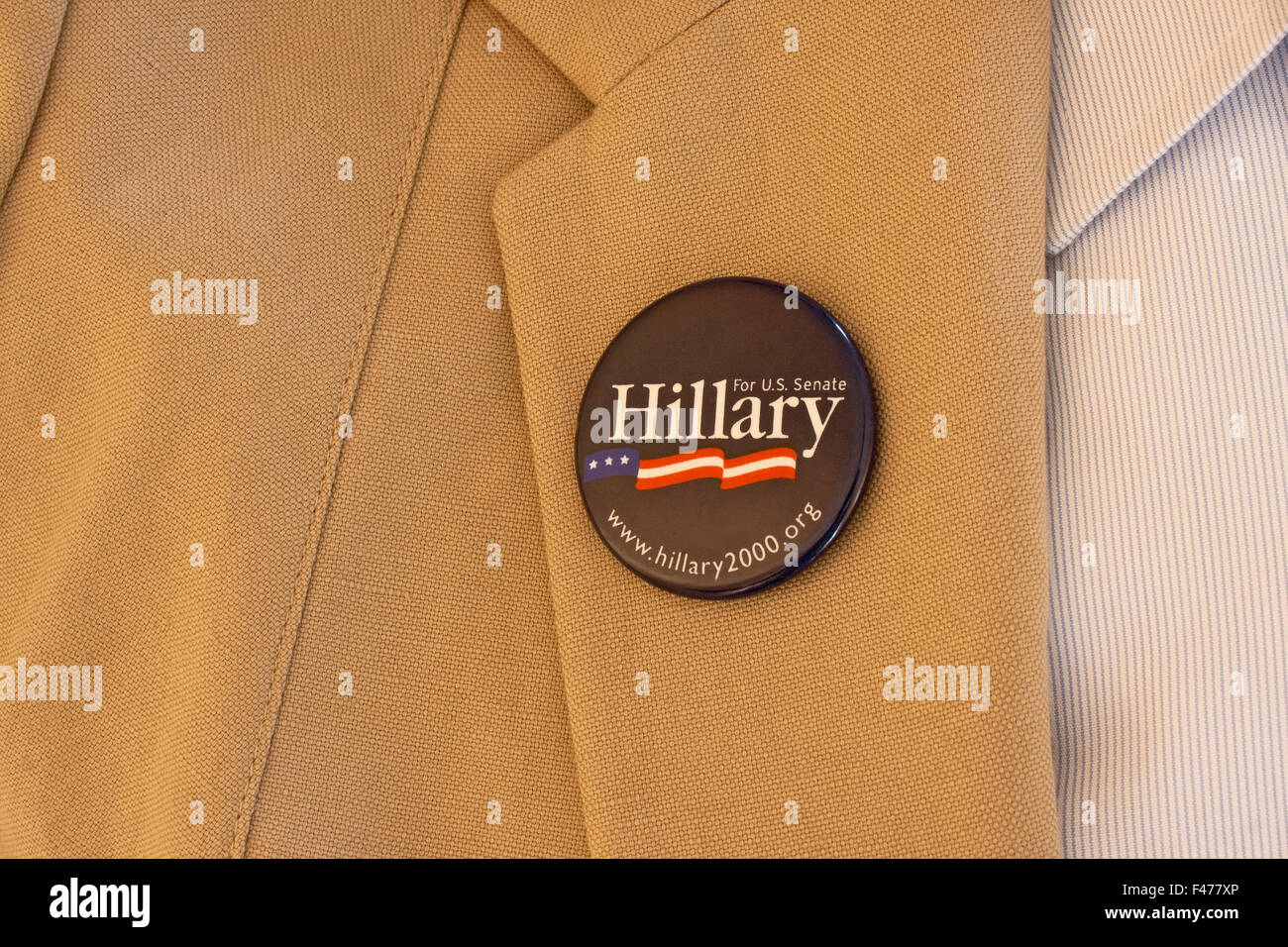 Hillary Clinton campaign button, US Senate, 2000, on a woman's lapel. Stock Photo