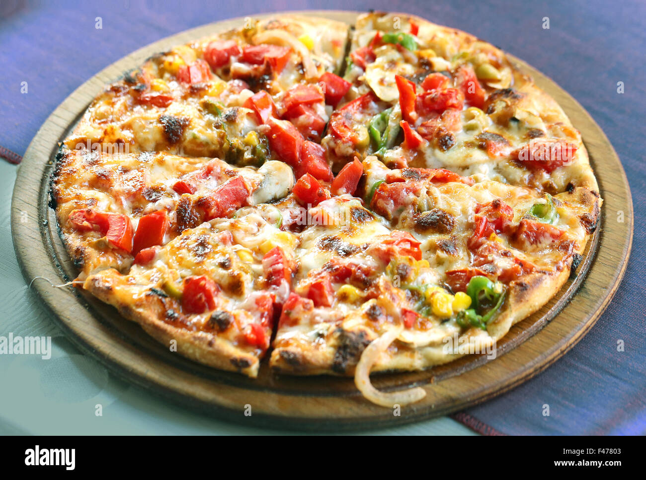 Most delicious pizza with cheese and mushrooms Stock Photo - Alamy