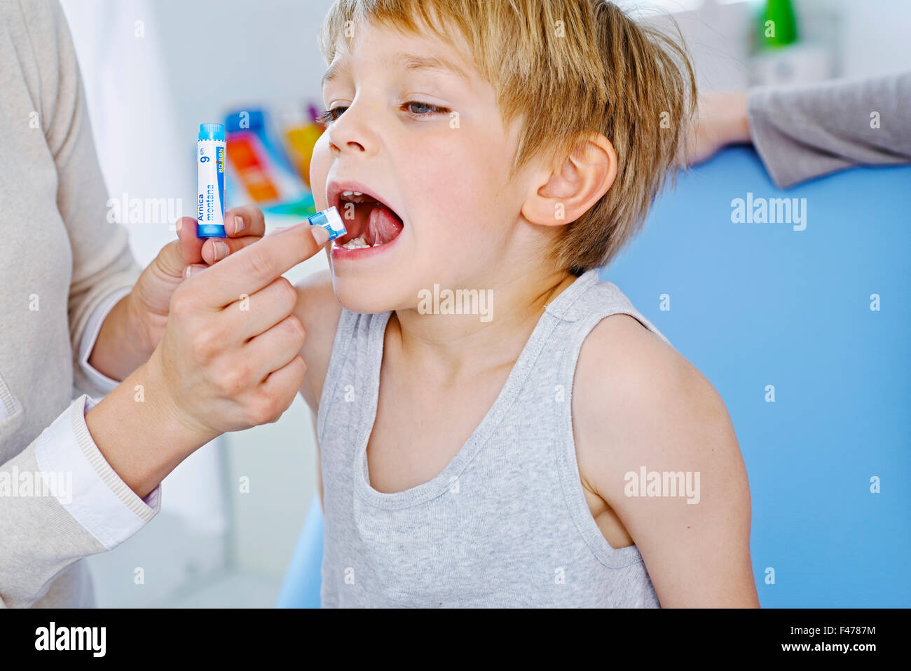 HOMEOPATHY CONSULTATION, CHILD Stock Photo Alamy