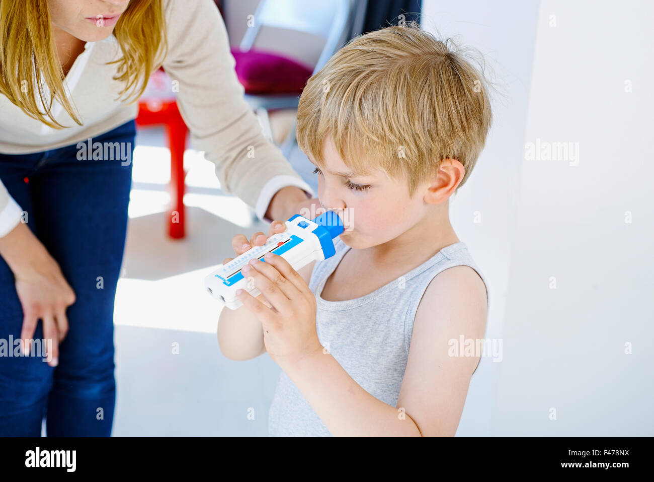 BREATHING, SPIROMETRY IN A CHILD Stock Photo