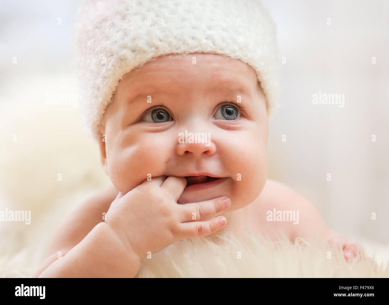 Portrait of adorable smiling baby girl Stock Photo