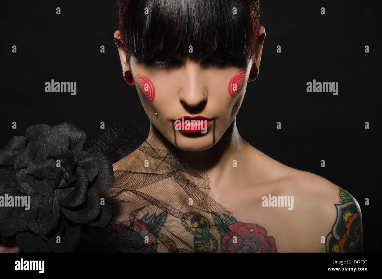 tattooed charming with black flower Stock Photo Alamy