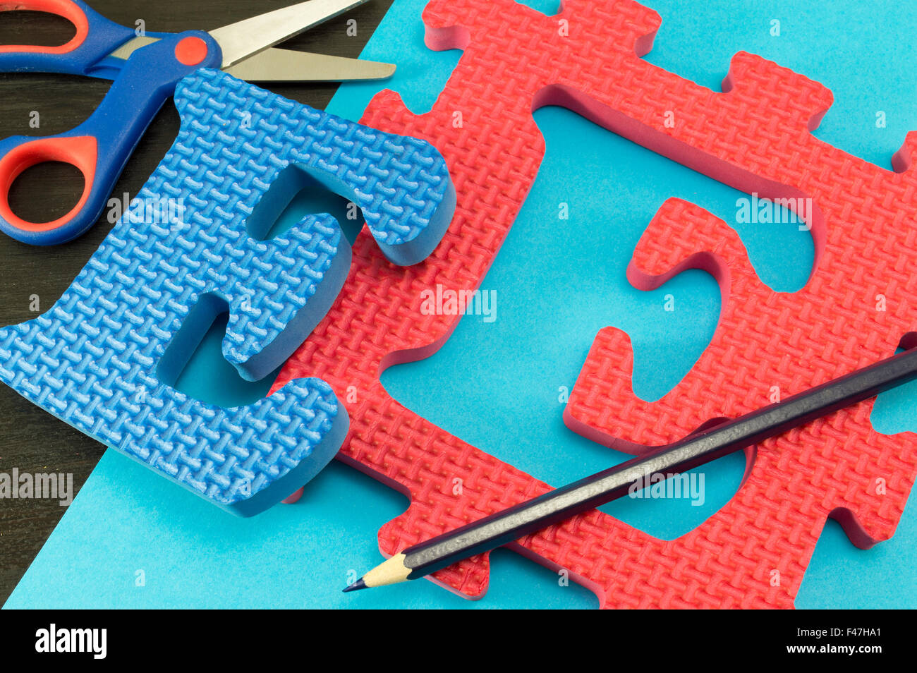 Learning the letter E The letter E learnign puzzle Stock Photo
