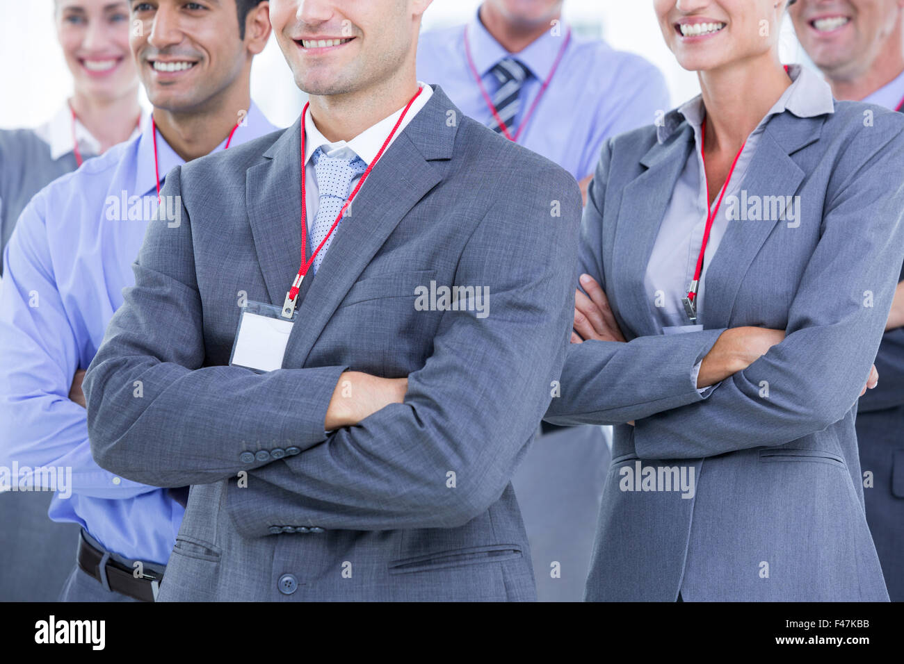 Business team smiling Stock Photo - Alamy