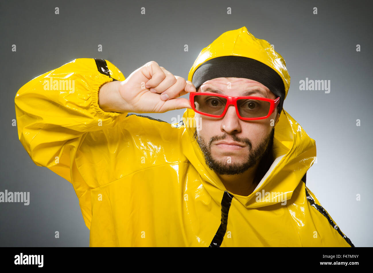 Funny man wearing yellow suit Stock Photo Alamy