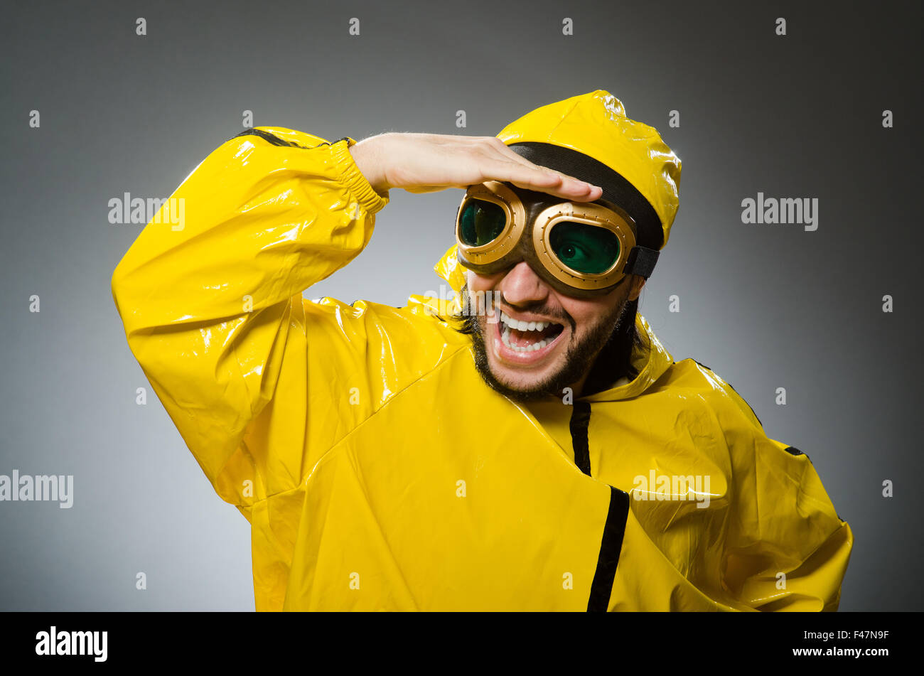 Man wearing yellow suit and aviator glasses Stock Photo Alamy