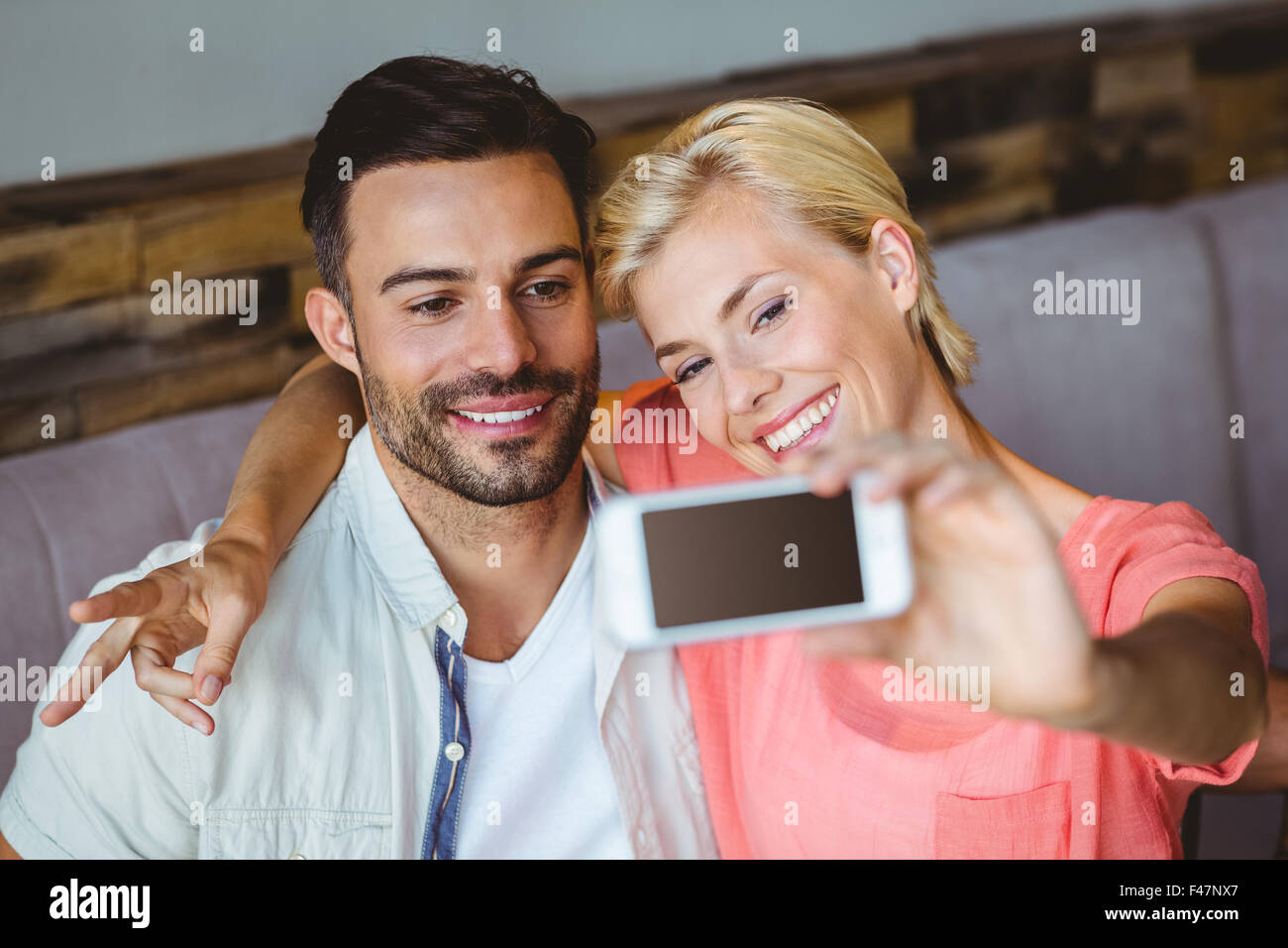 Couple taking a selfie Stock Photo - Alamy