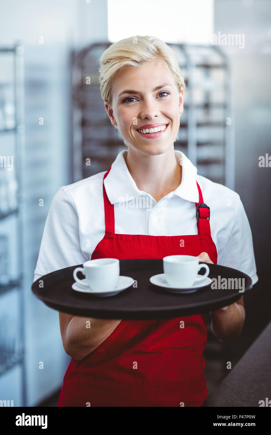 Pretty Barista Holding Two Cups Of Coffee Stock Photo Alamy Pretty barista holding two cups of coffee stock photo alamy