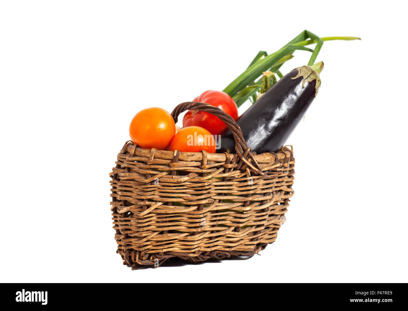 Fresh vegetables in basket isolated on white Stock Photo - Alamy