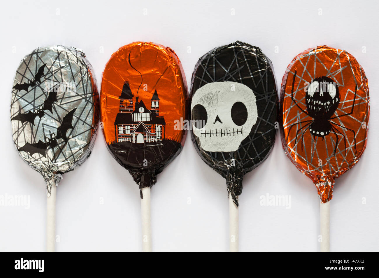 M&S 4 spooky chocolate lollies foil wrapped with different designs