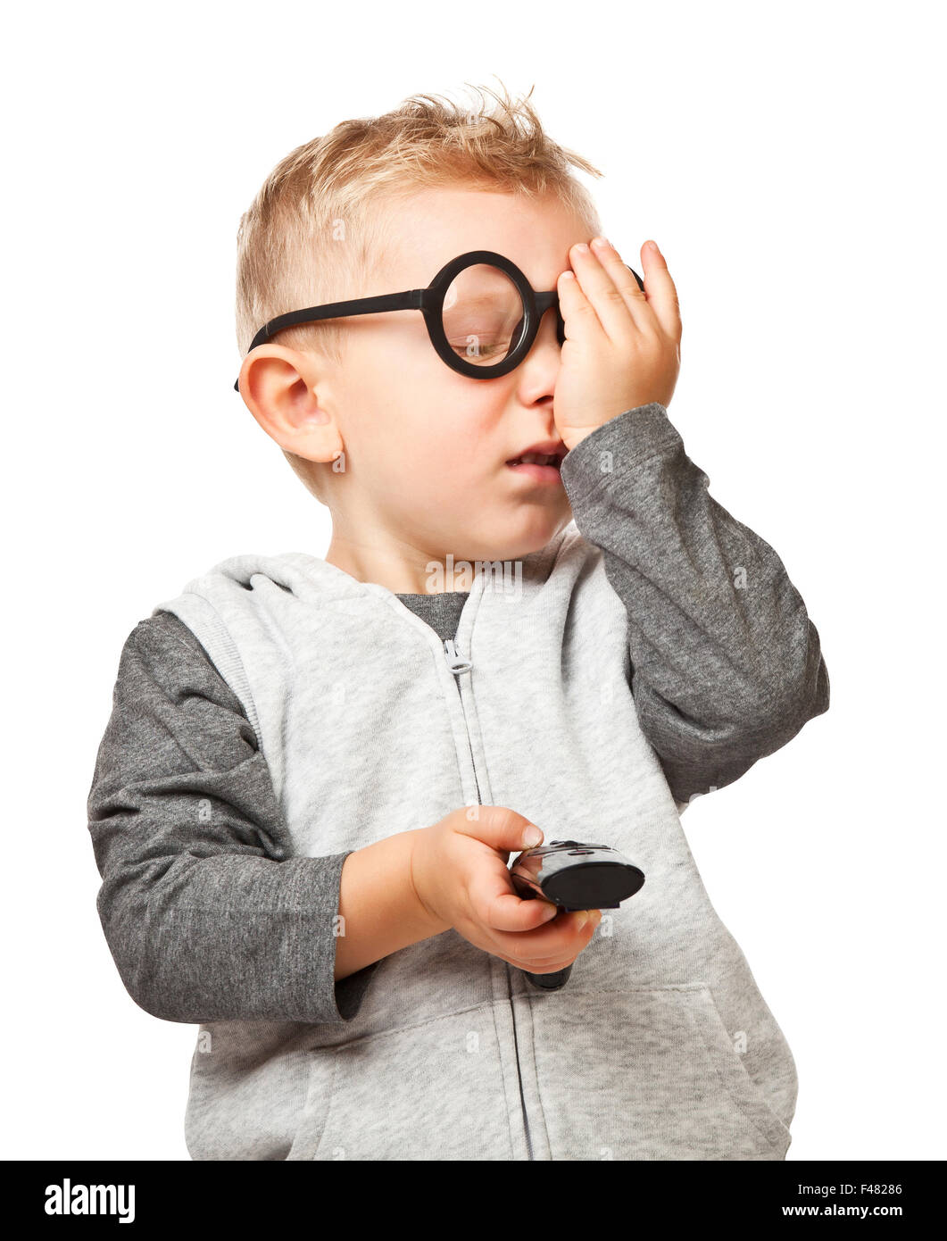 child with remote control and funny glasses Stock Photo