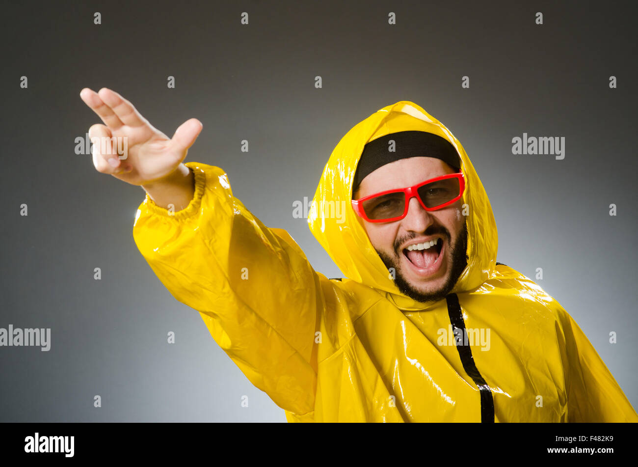 Funny man wearing yellow suit Stock Photo Alamy