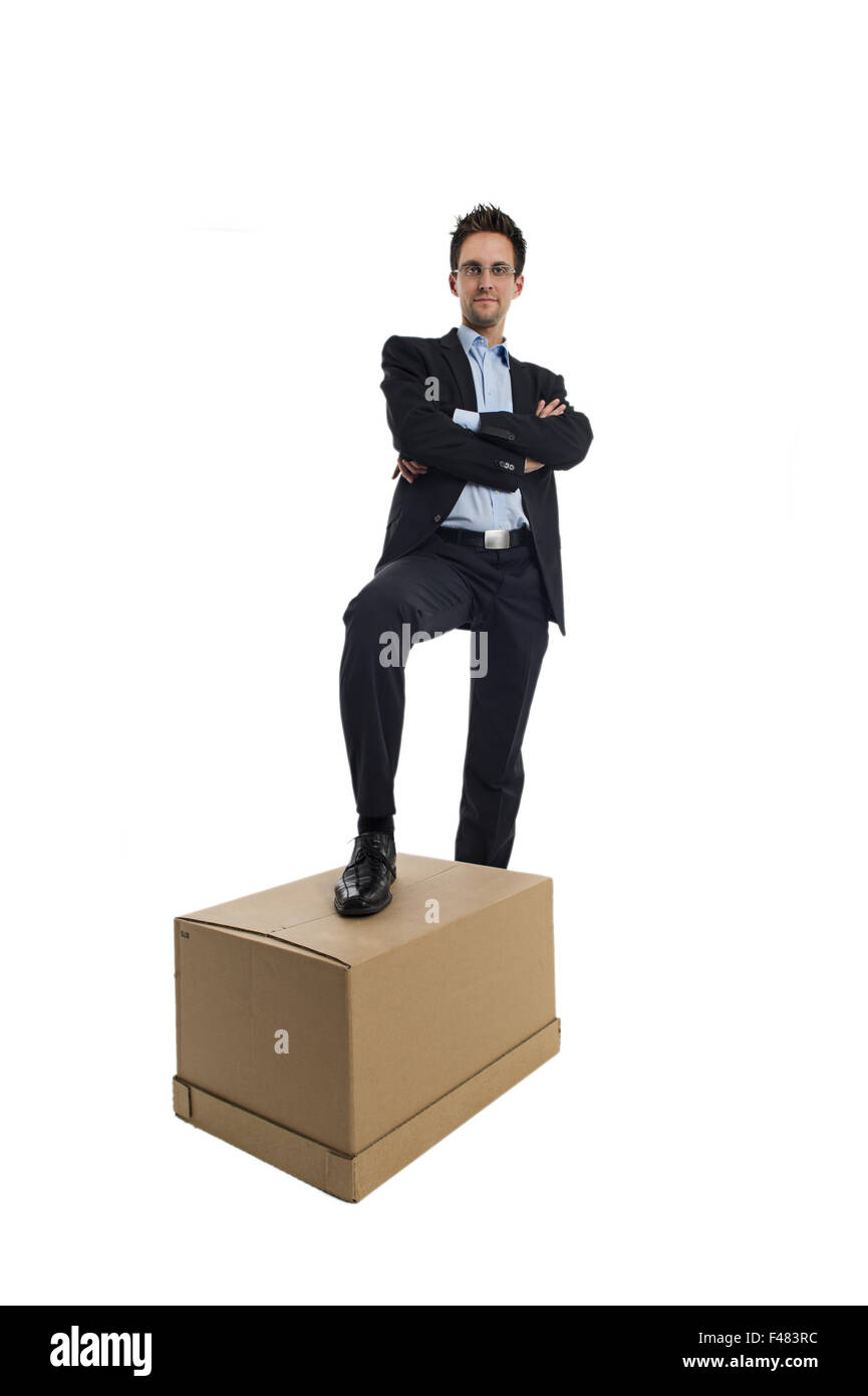 Businessman with a box Stock Photo