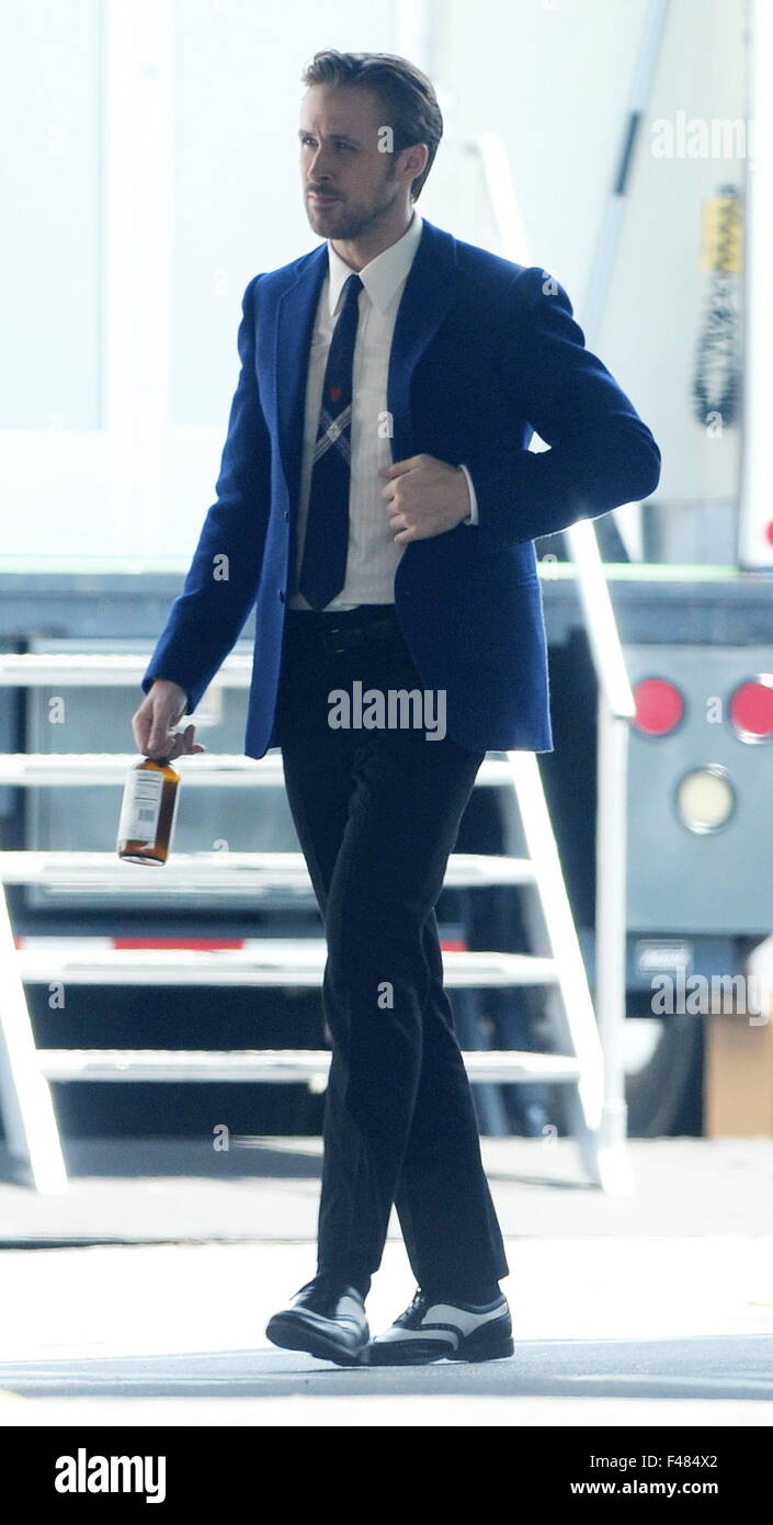 Actress Emma Stone glowing in her blue dress on the set of