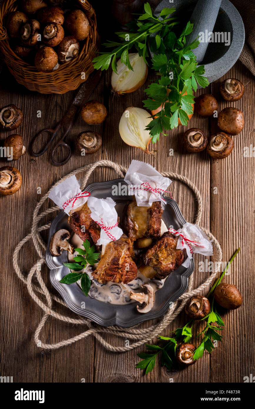 Grilled rinderrippchen with mushroom sauce Stock Photo - Alamy