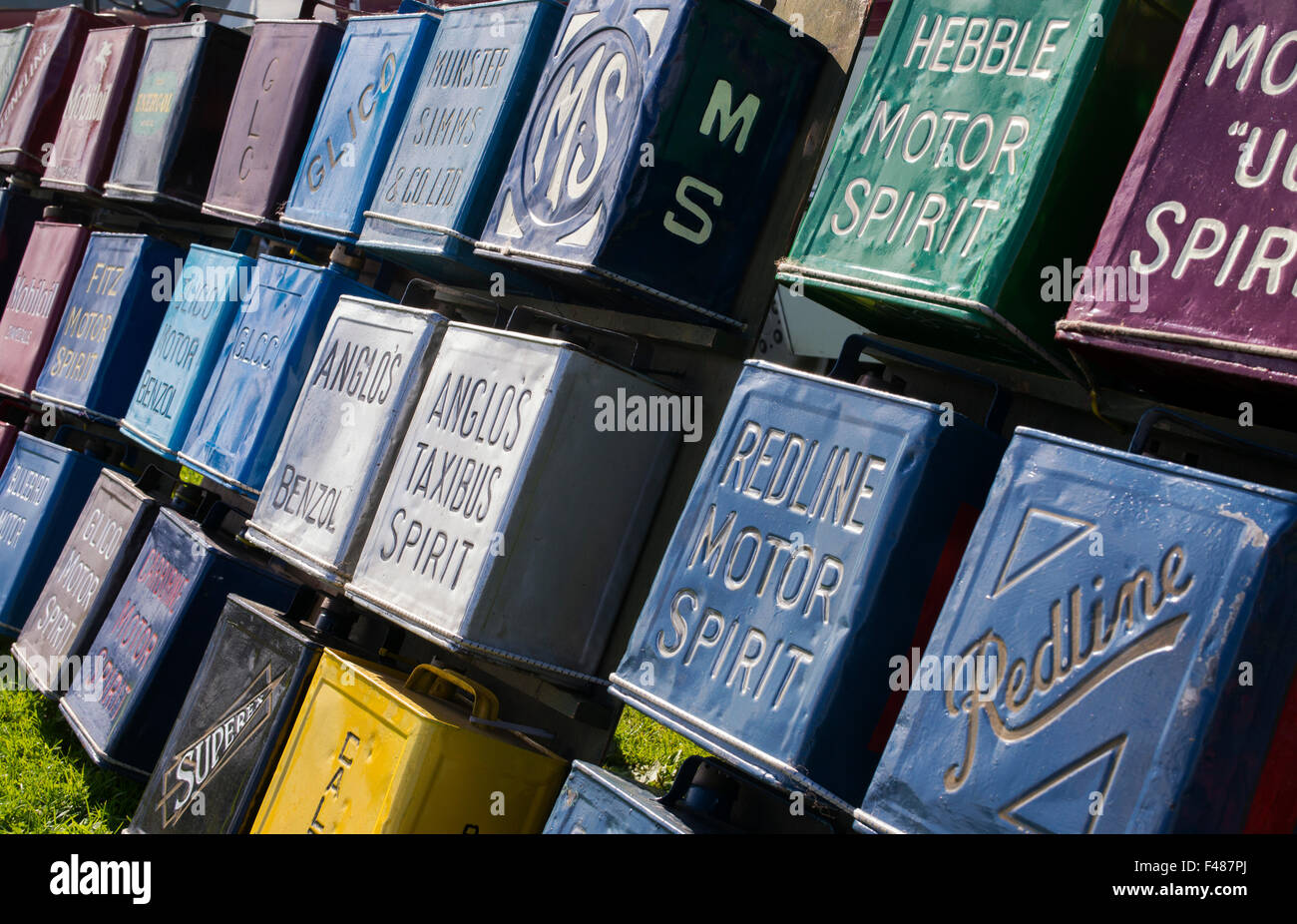 Old shell motor oil metal cans Stock Photo