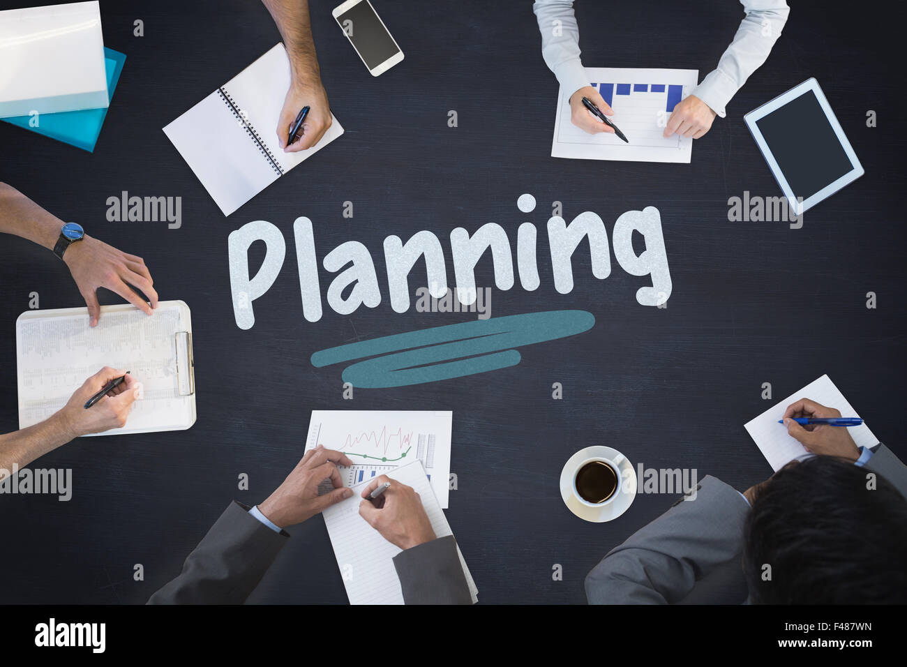 Planning against blackboard Stock Photo - Alamy