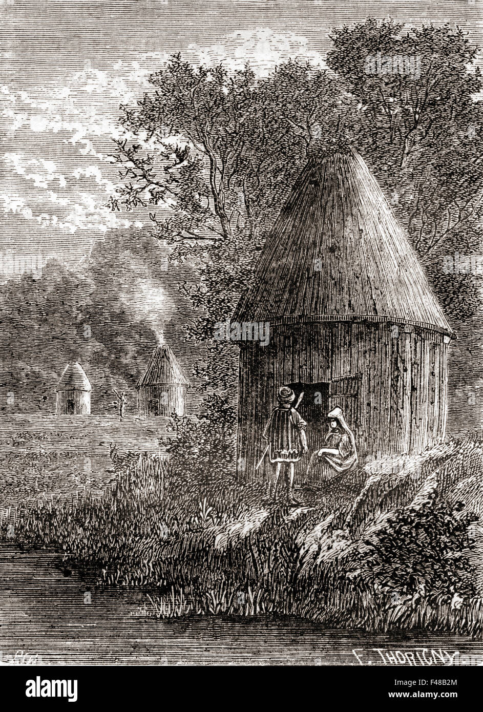 Early Gallic houses, a round cabin with a hole in the roof to allow the smoke from the fire to escape. Stock Photo