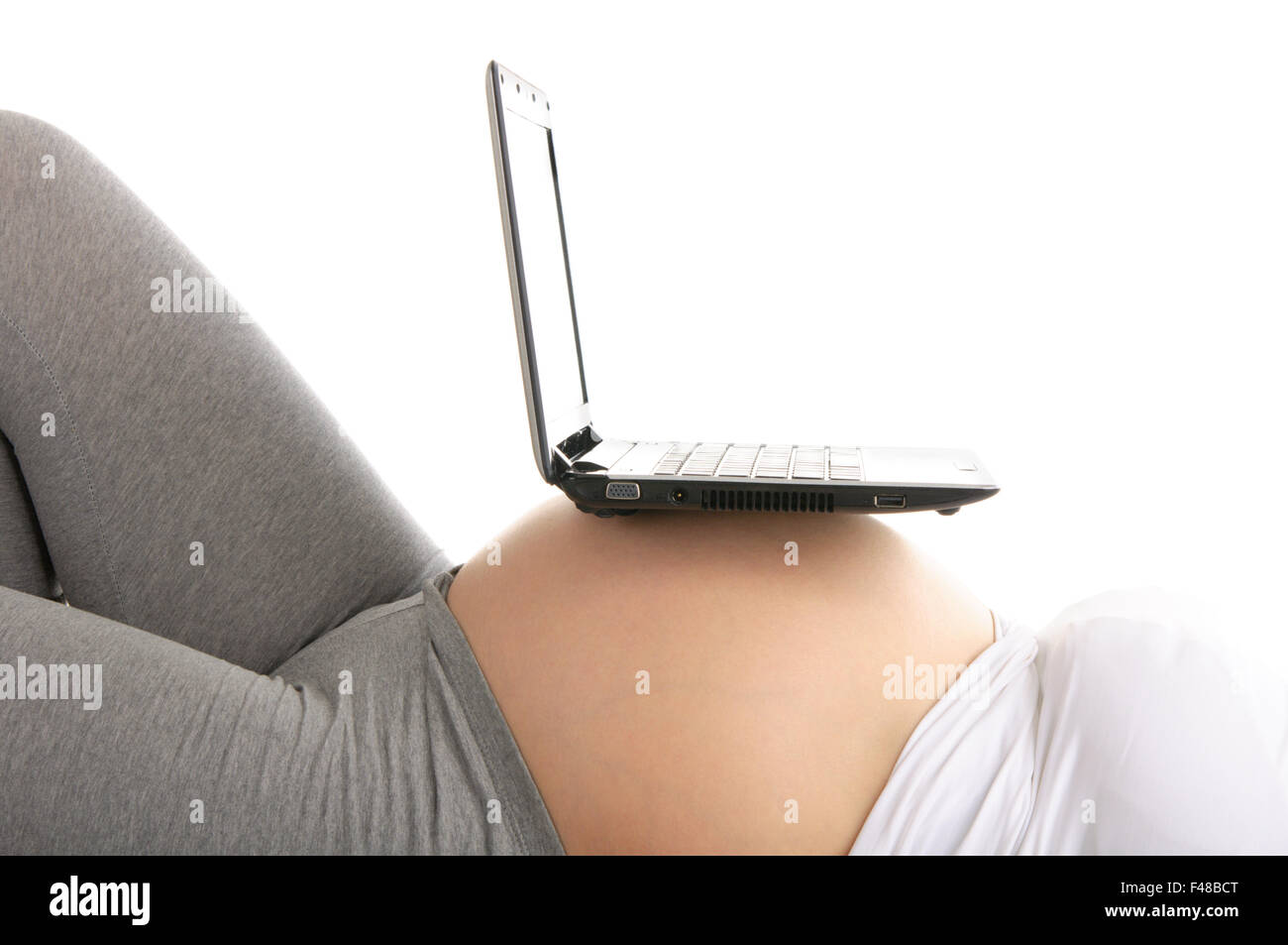 laptop on stomach pregnant woman Stock Photo Alamy