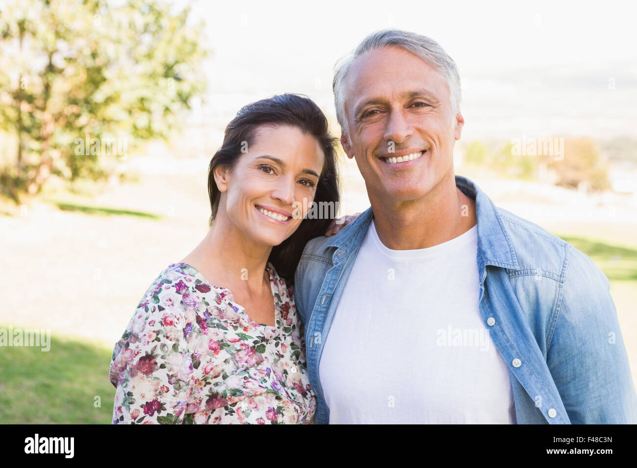 Loving couple in park hi-res stock photography and images - Alamy