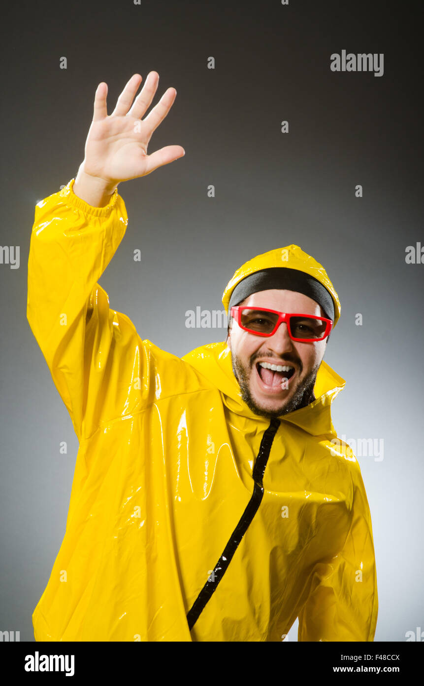 Funny man wearing yellow suit Stock Photo Alamy
