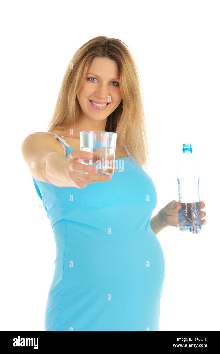 pregnant woman holds out glass of water Stock Photo Alamy