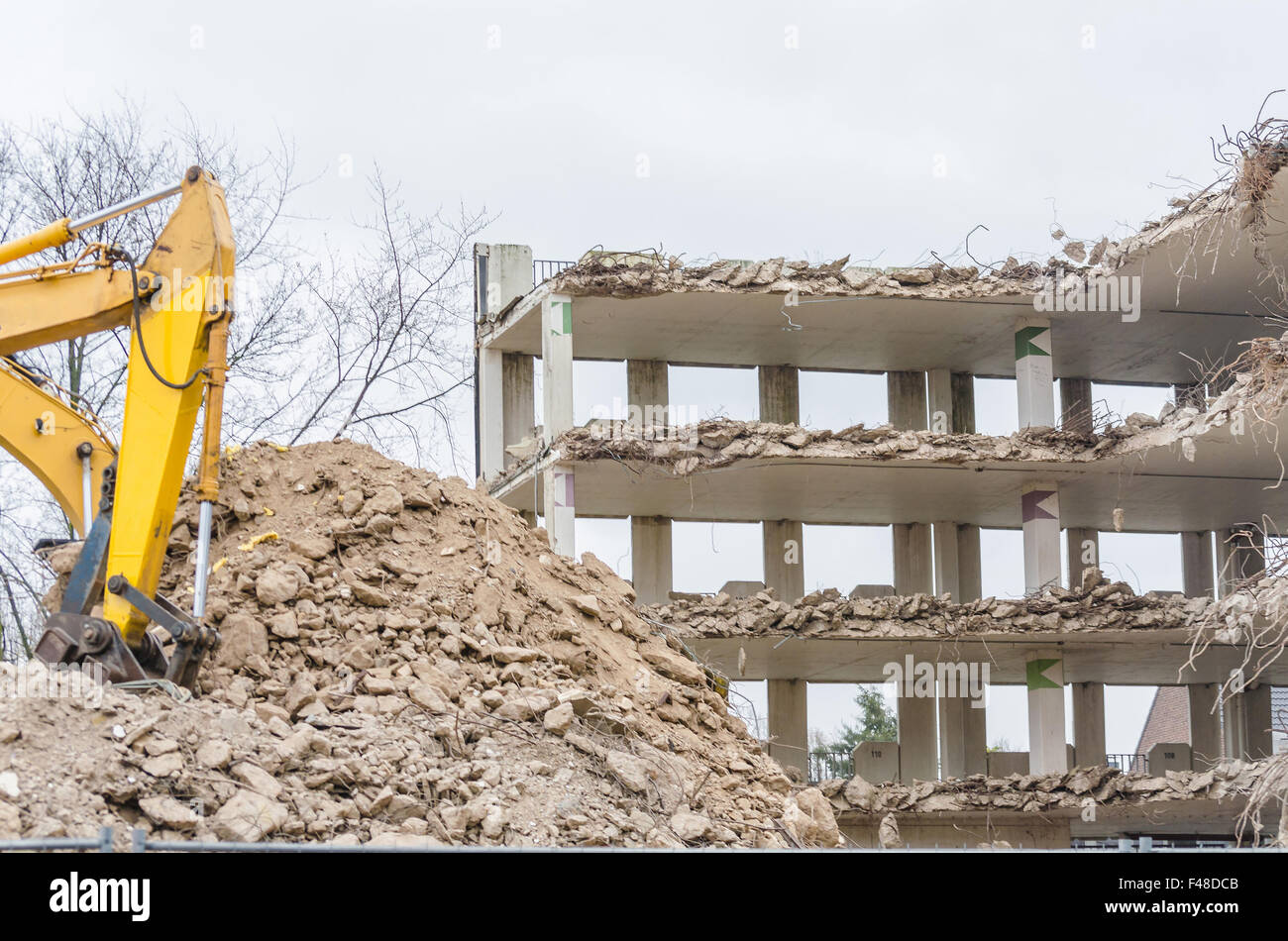 Excavator in demolition work Stock Photo