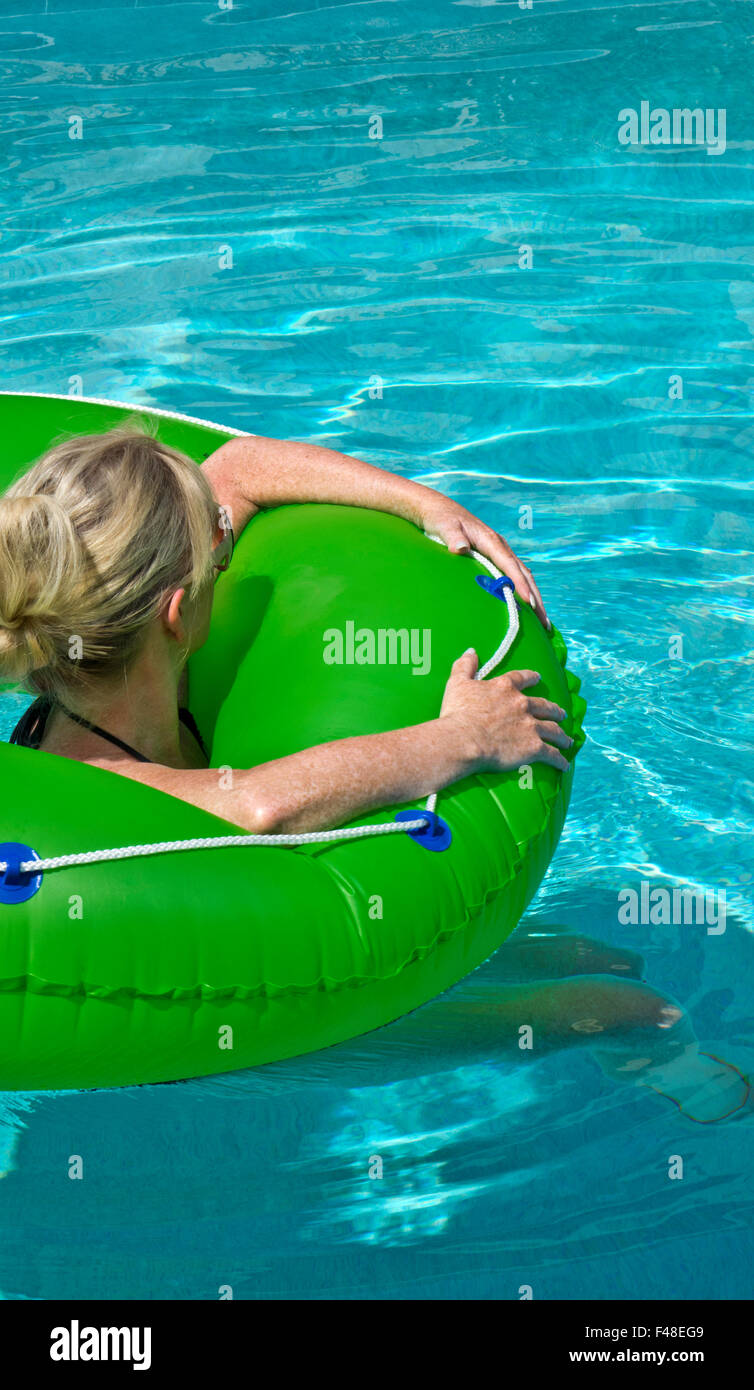 Woman in a swimming pool Stock Photo