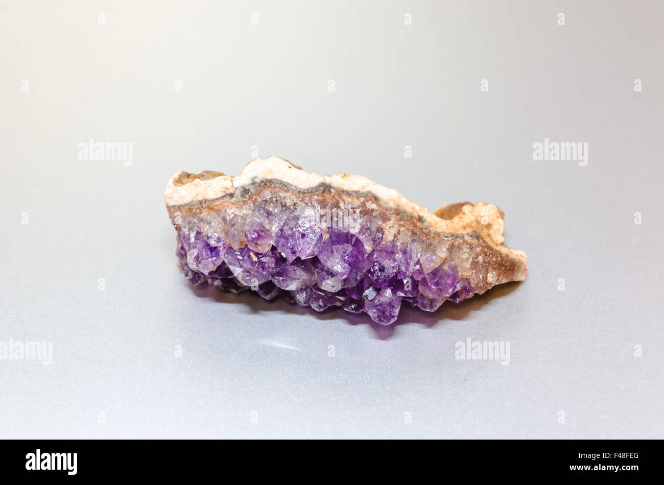Raw Amethyst crystal. Stock Photo
