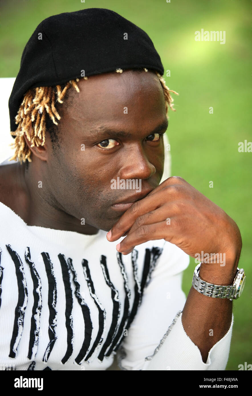 Portrait of young sad man Stock Photo - Alamy