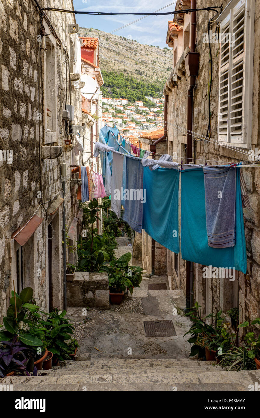 Narrow And Empty Alley Stairs And Laundry Hanging Above At The Old Town In Dubrovnik Croatia Stock Photo Alamy